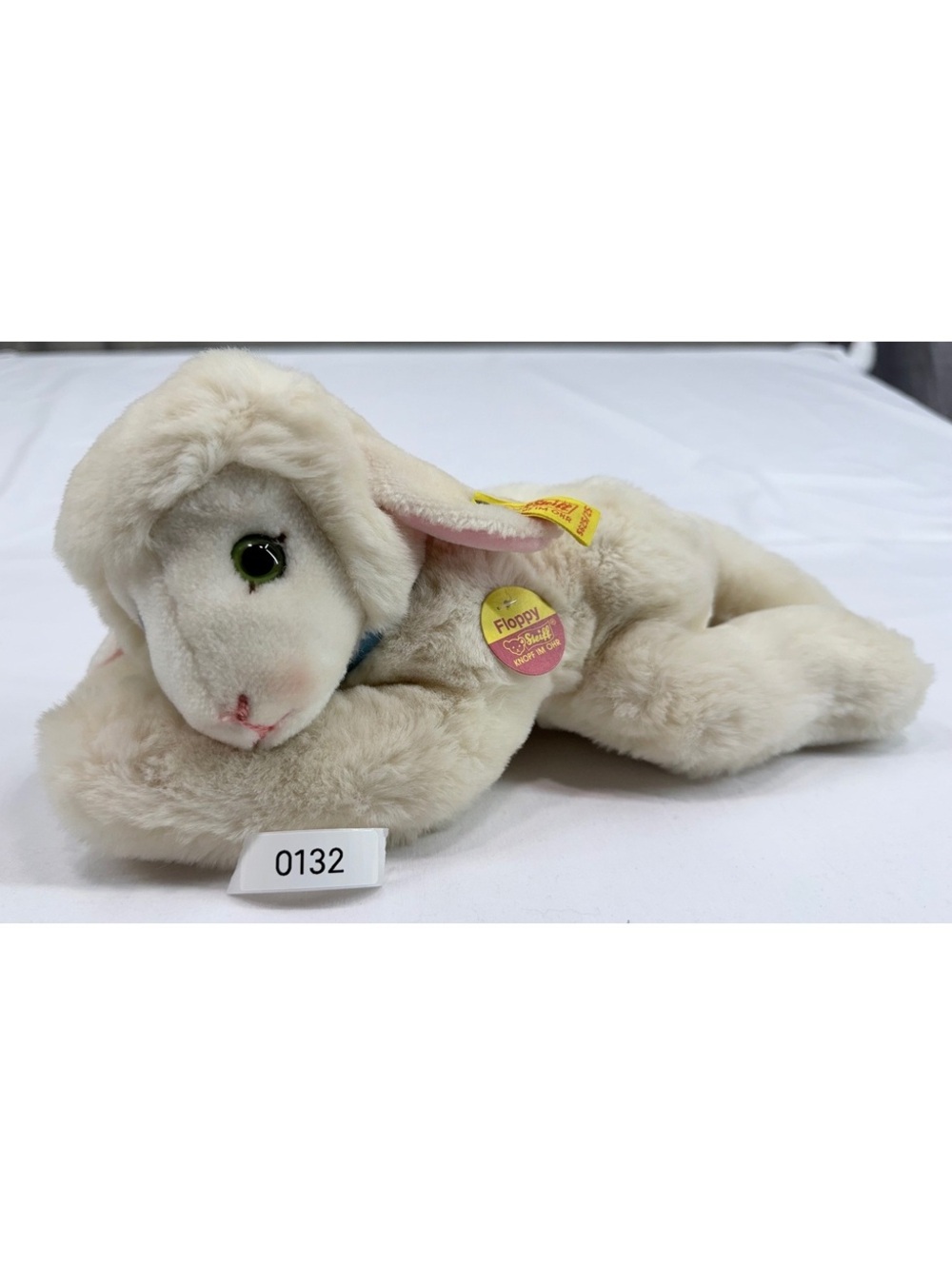 Steiff Floppy Lamb Plush Toy with Blue Ribbon, Soft Acrylic and Cotton Material
